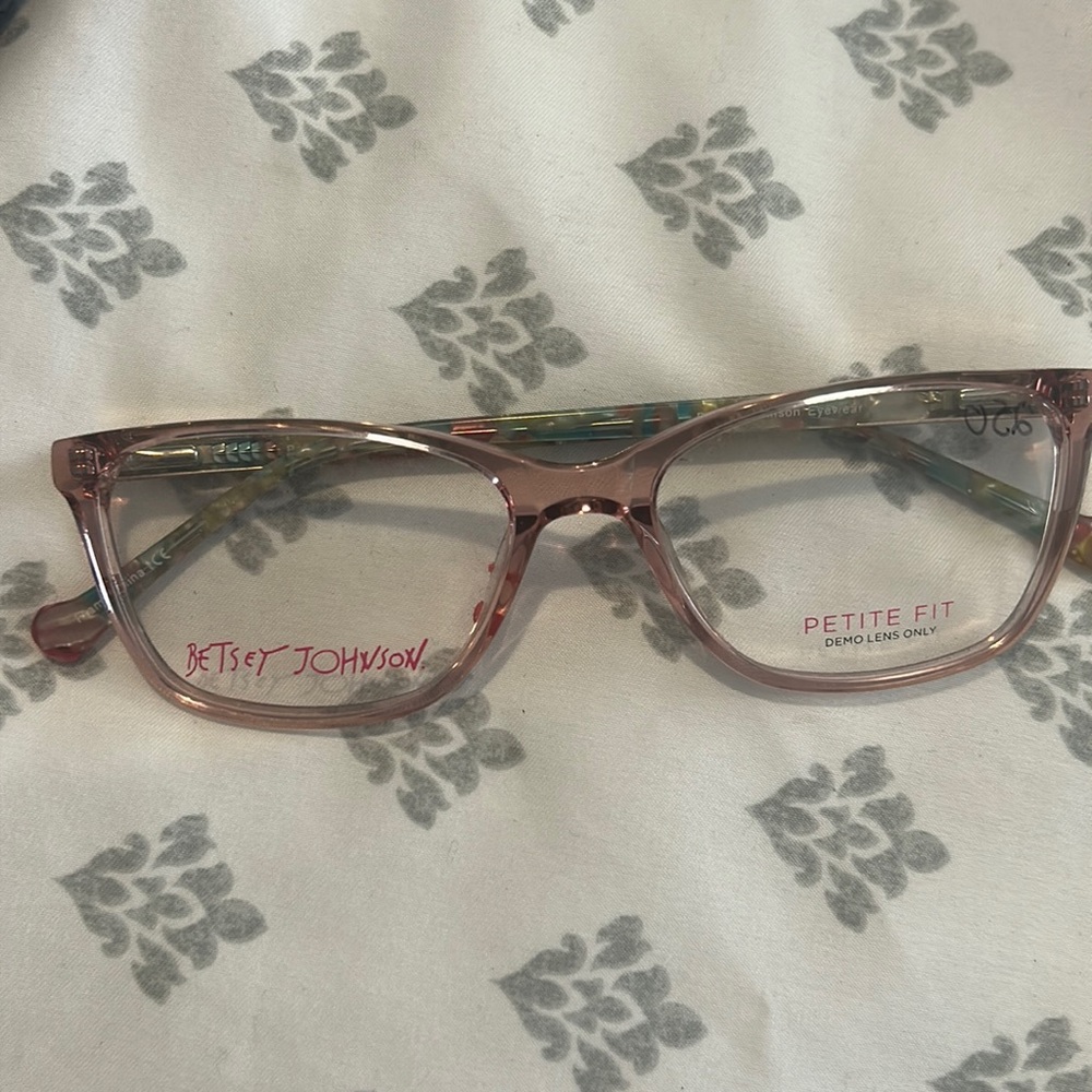 Betsy Johnson eyeglass frames originally $250. Clear eye frame , floral arms